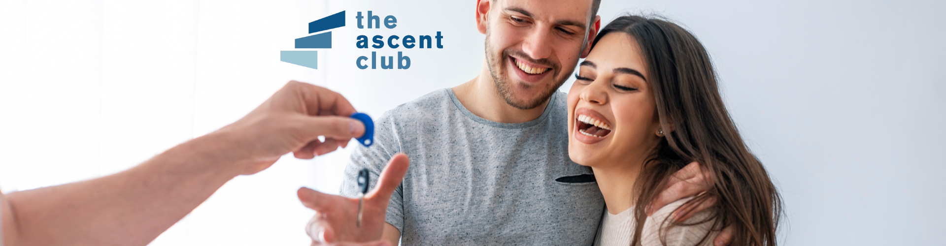 A man and woman smiling.