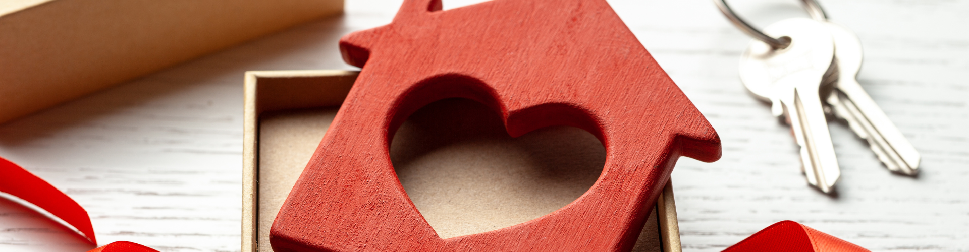 A red heart shaped object.