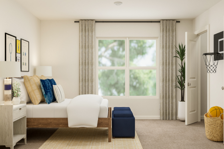 A living room with a couch and a chair.