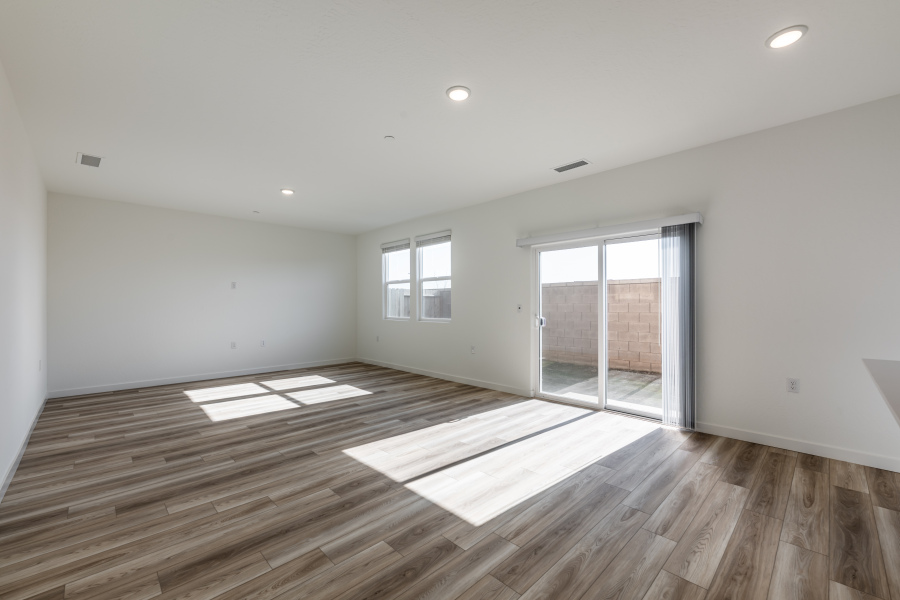 A room with a wood floor and a wood floor.