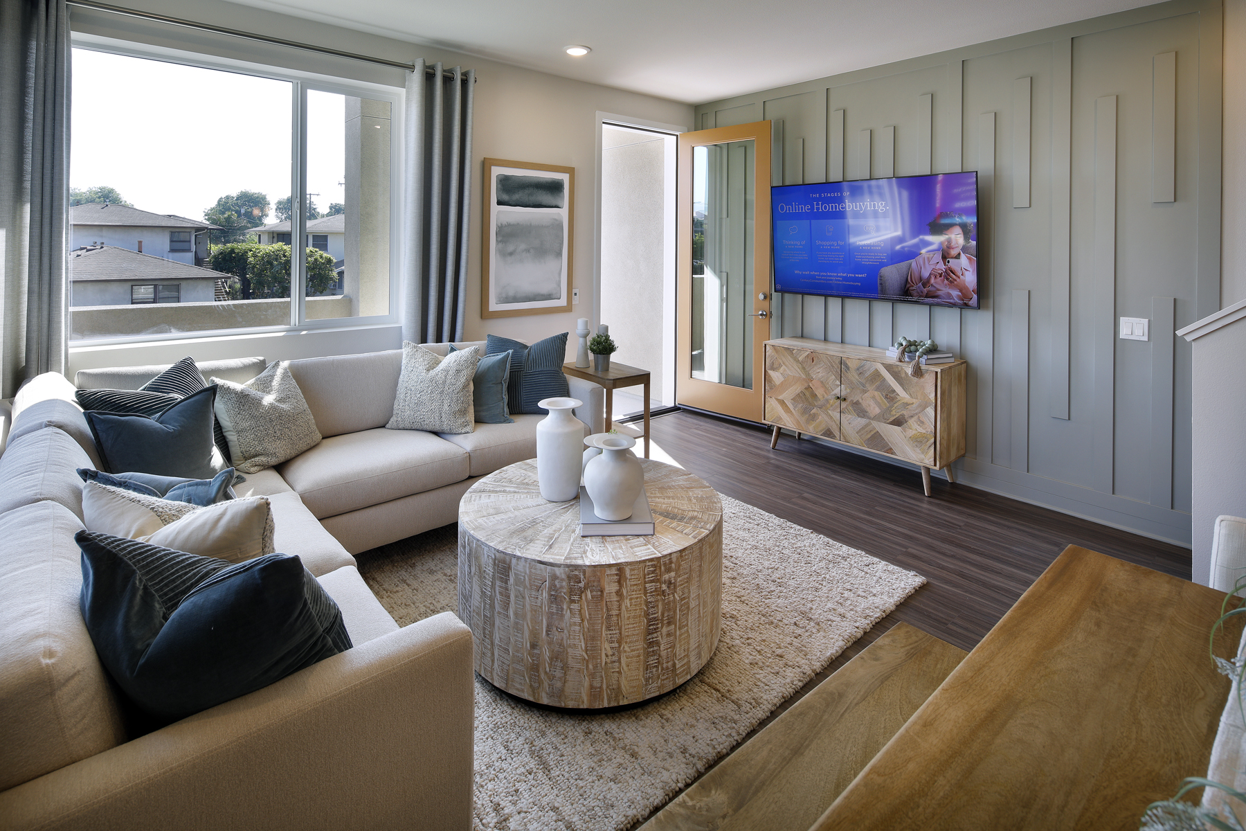 A living room with a large window.