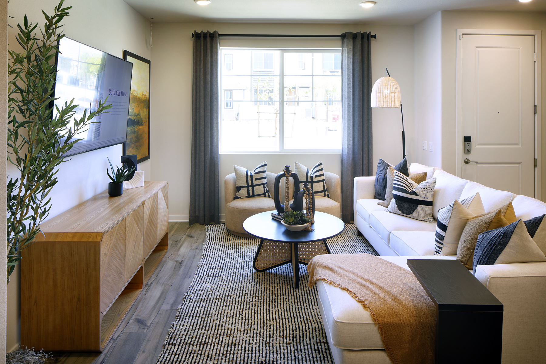 A living room with a couch and a coffee table.