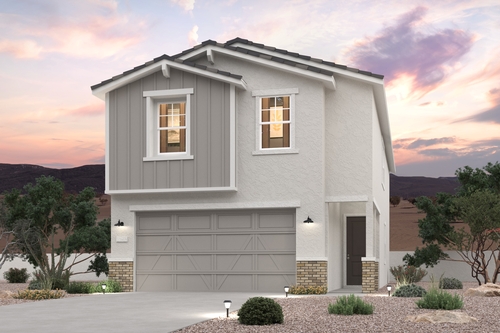 A white house with a garage.