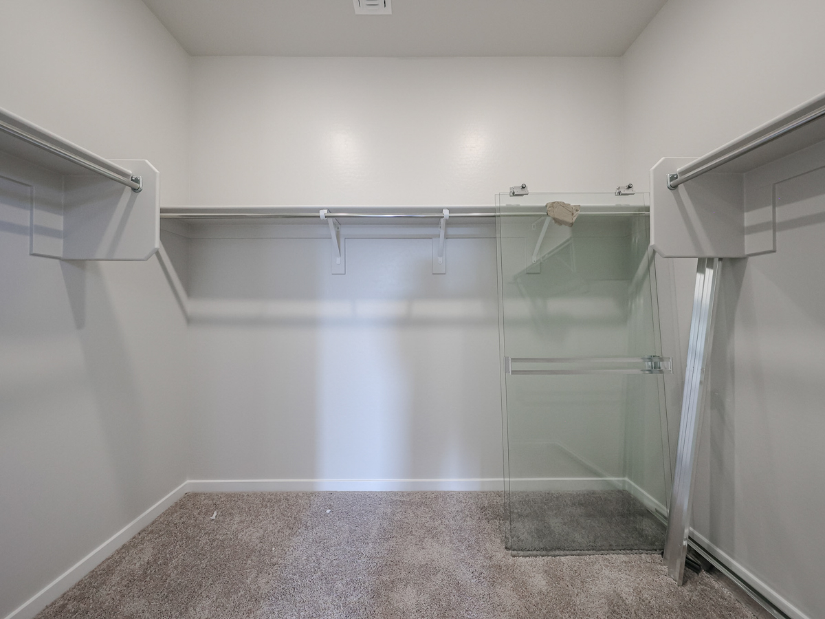 A room with a glass door.