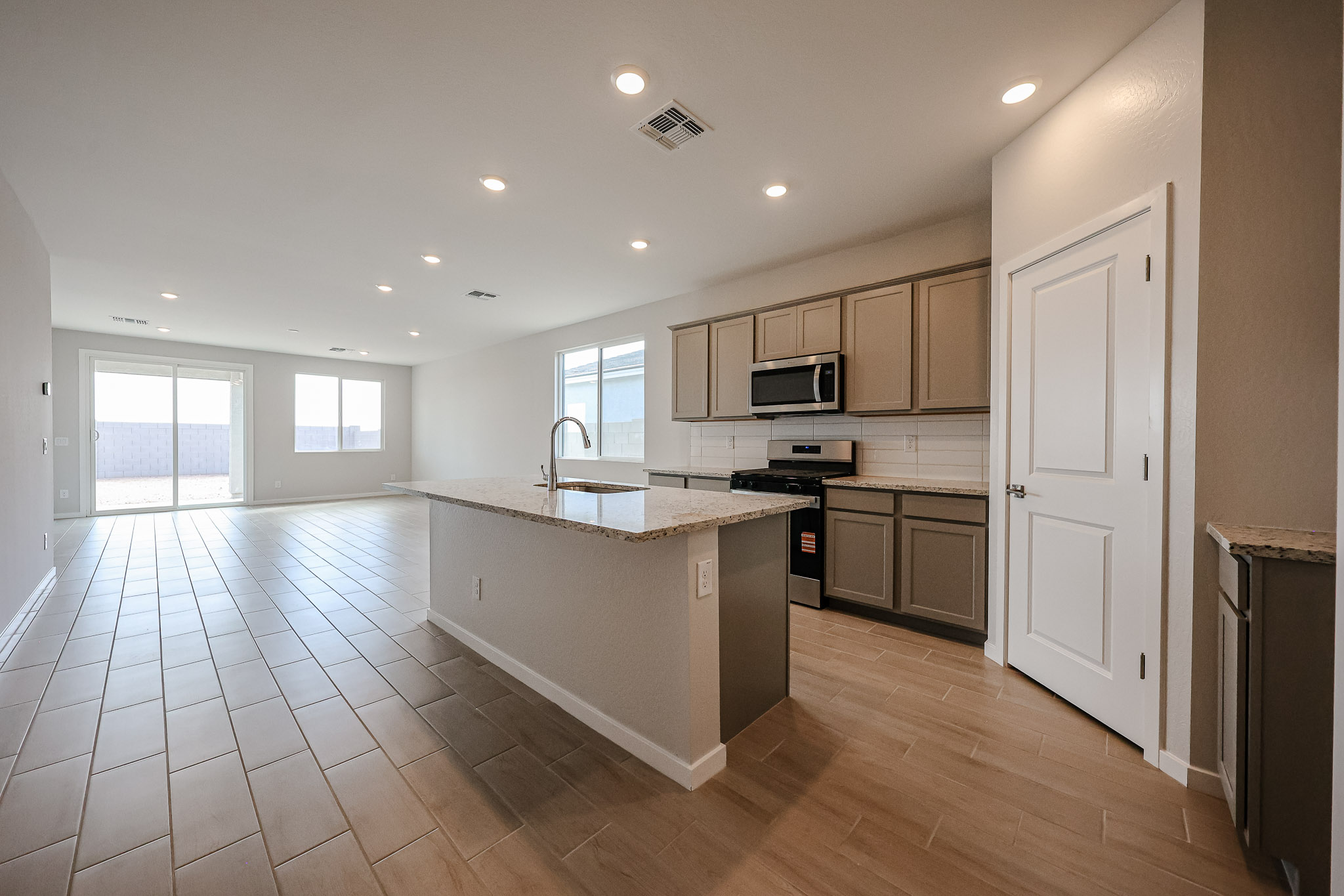 A kitchen with a large island.