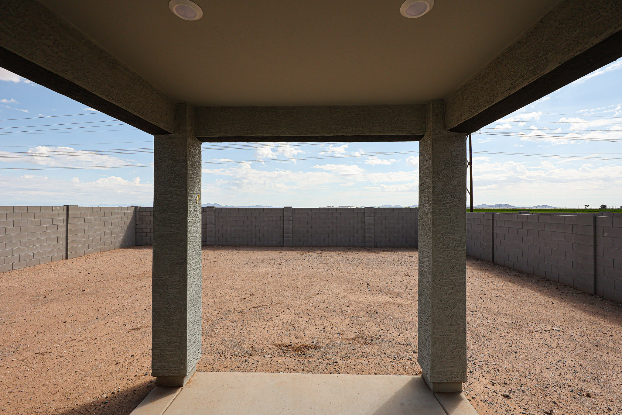 A concrete structure with a fence around it.