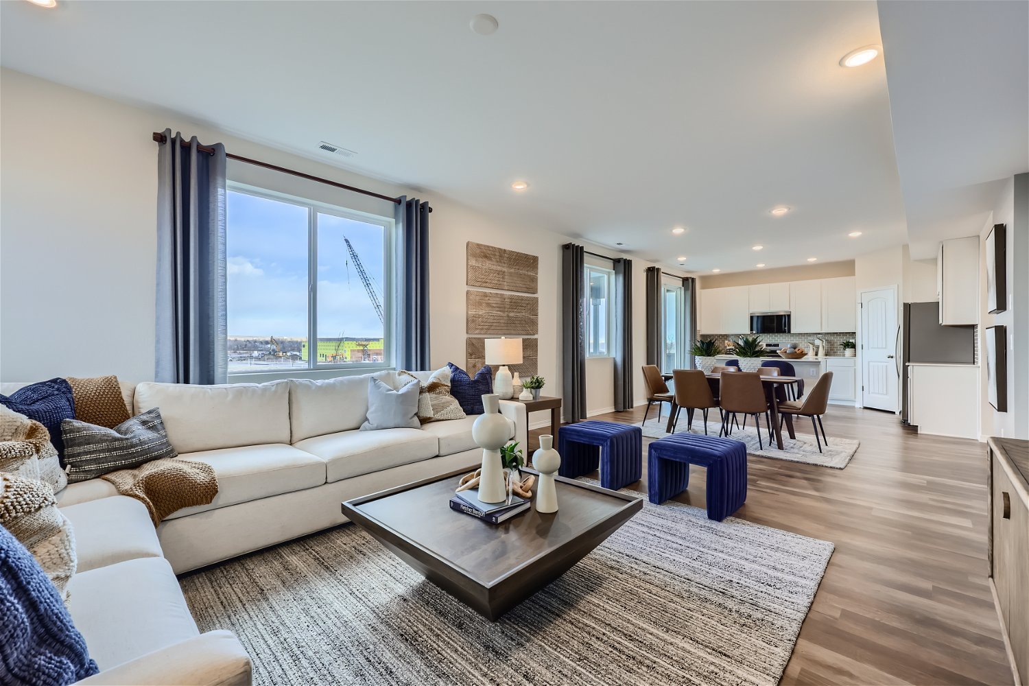 A living room with a large window.
