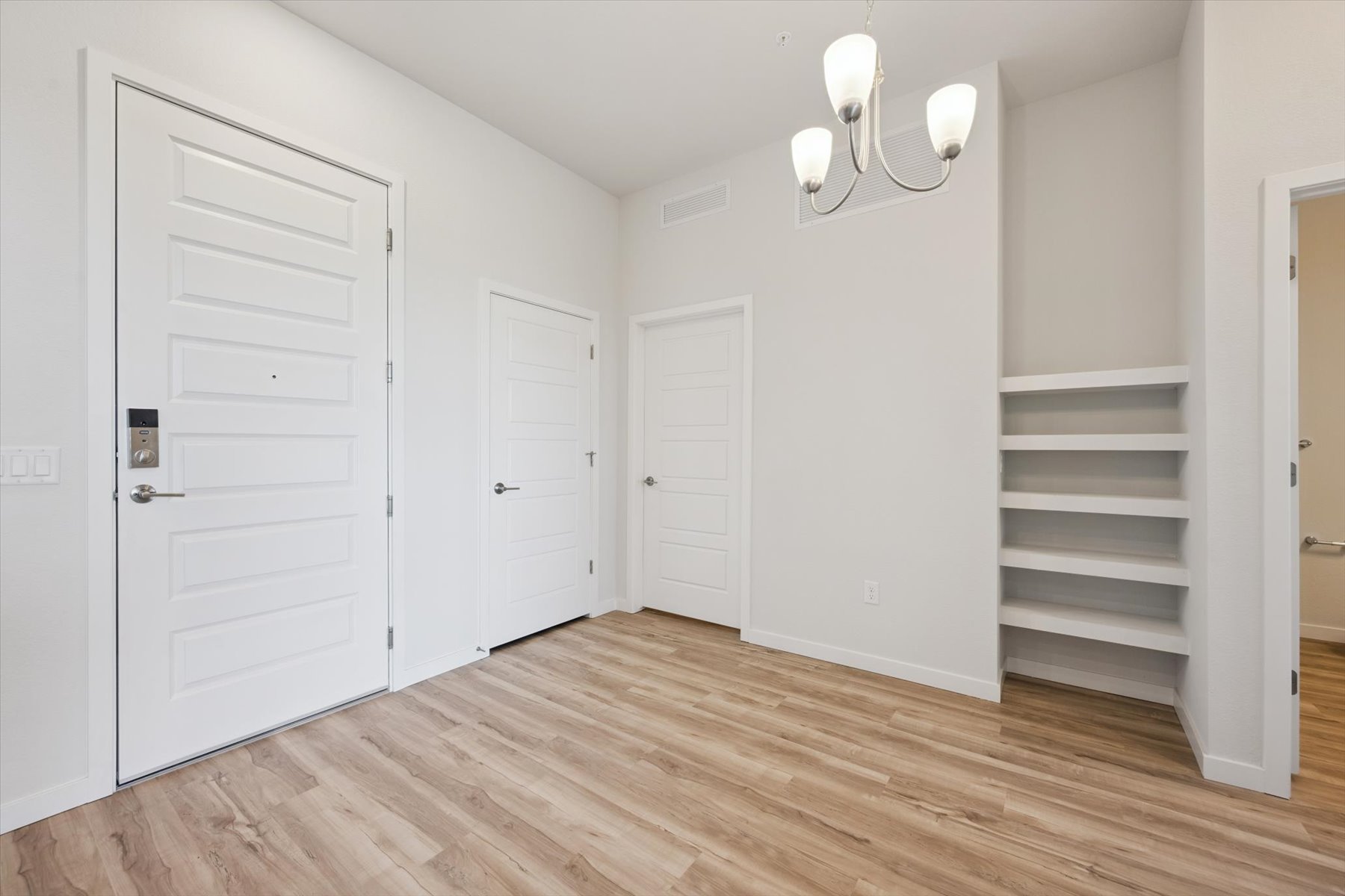 A room with white doors.