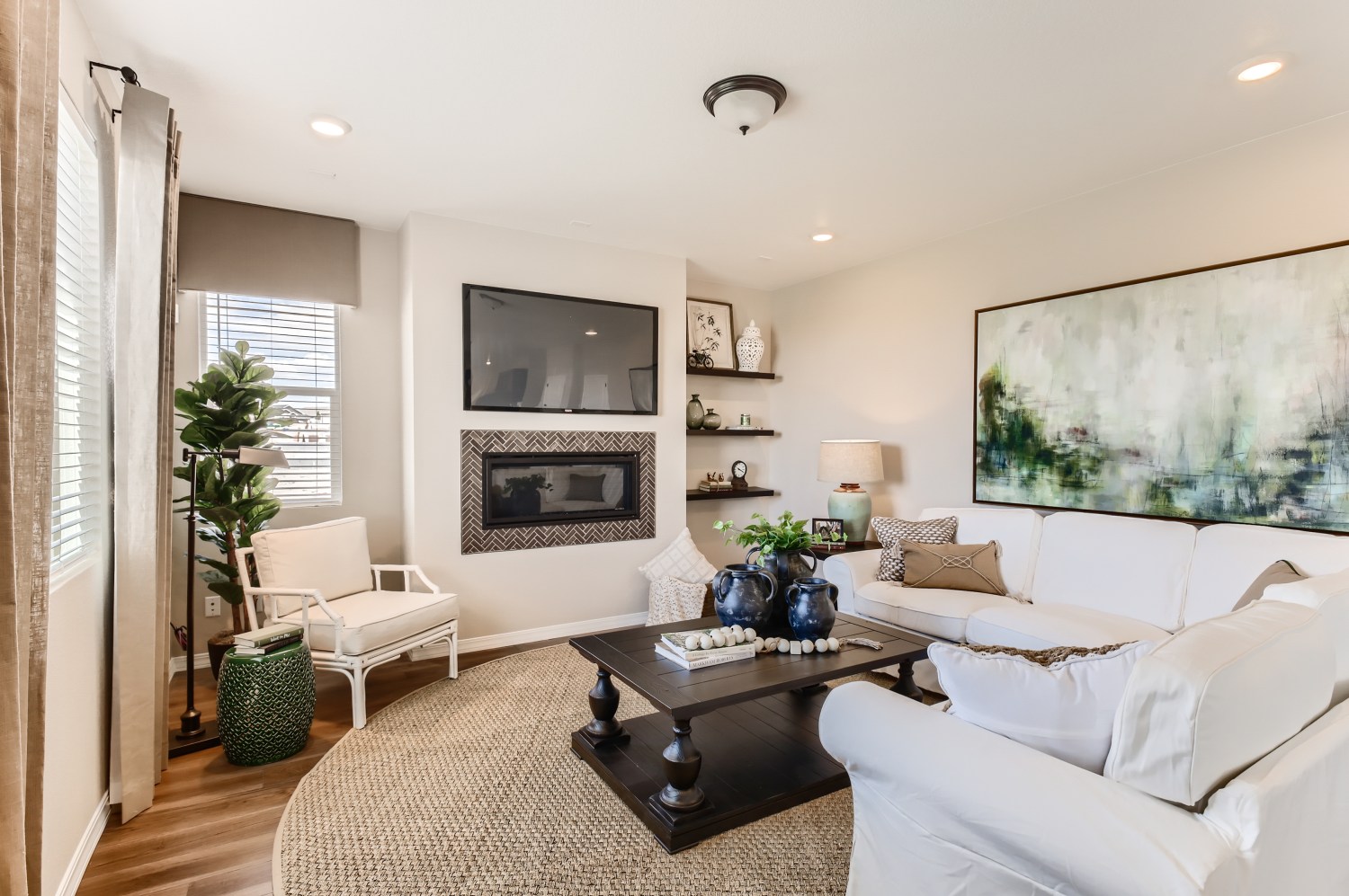 A living room with a fireplace.