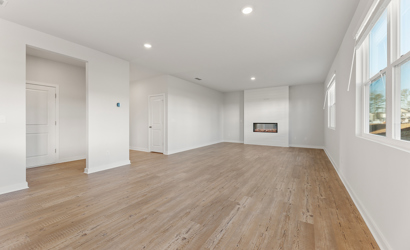 A room with wood floors.