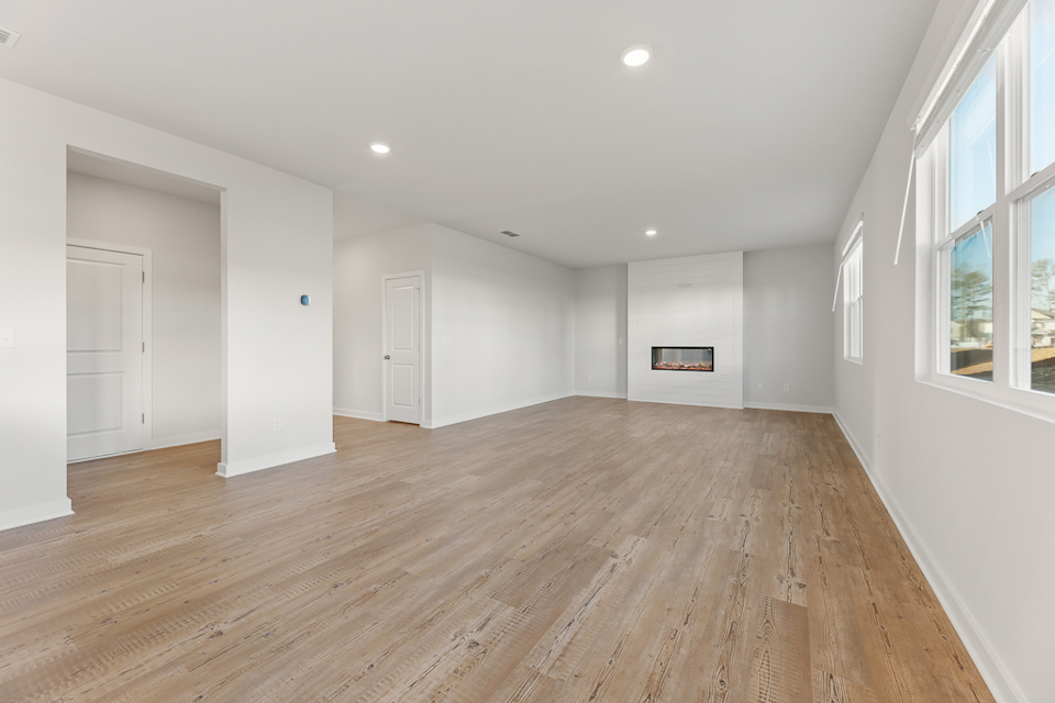 A room with wood floors.