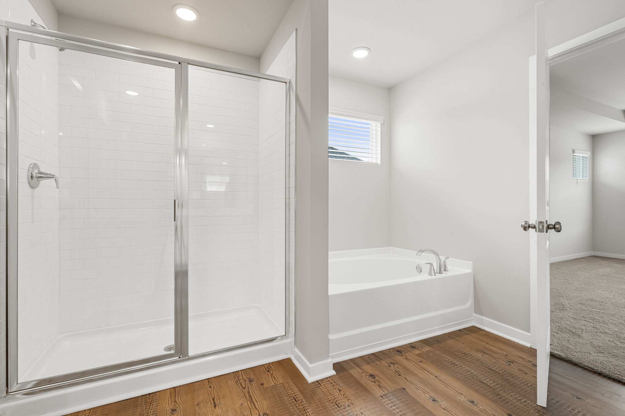 A bathroom with a glass shower.