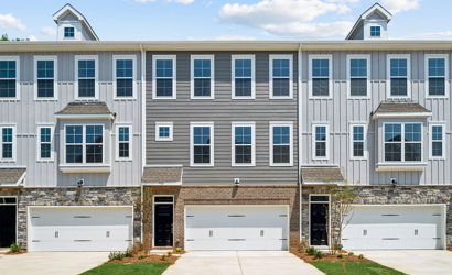 A building with a large front yard.