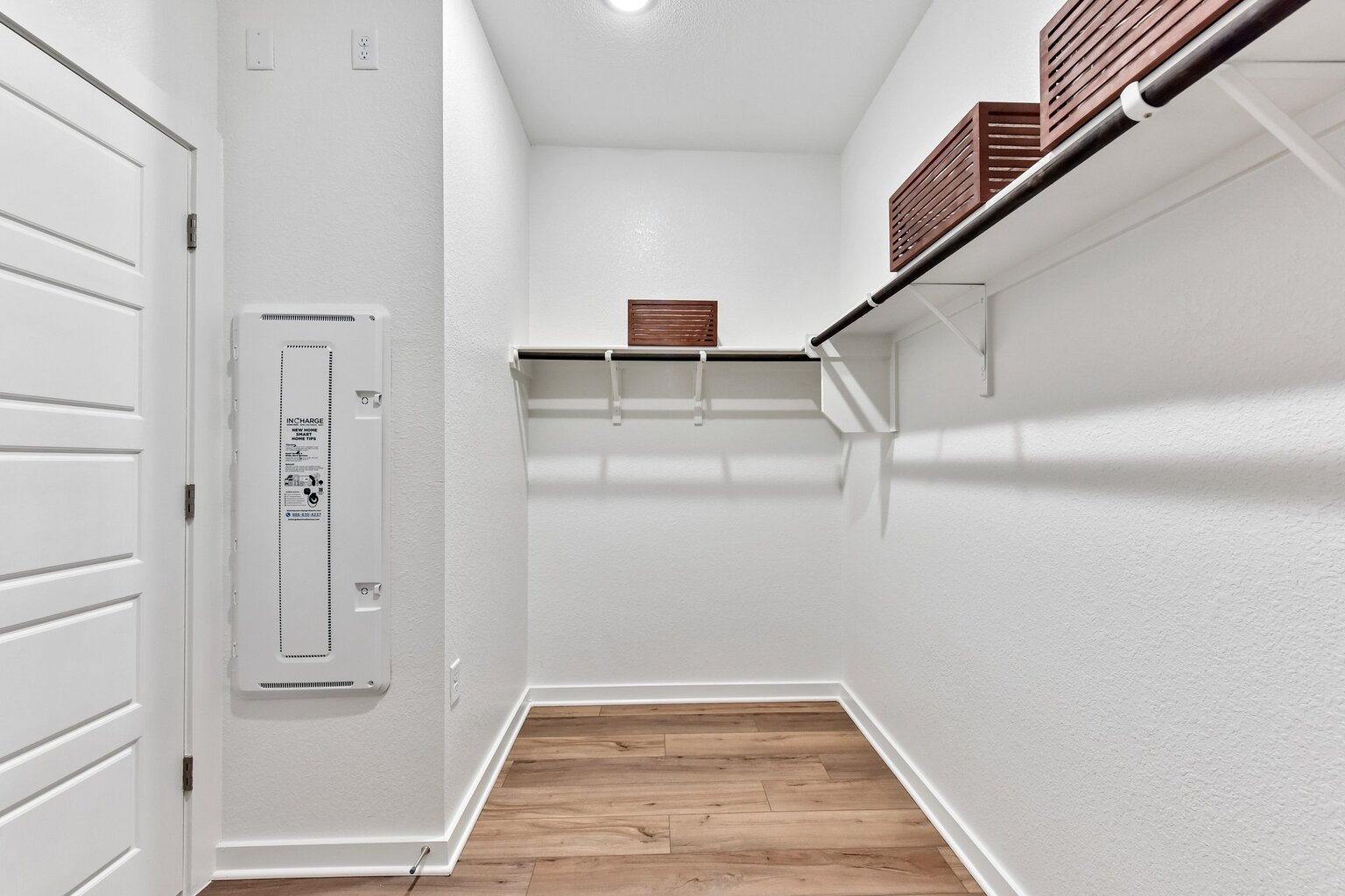 A white room with a staircase.