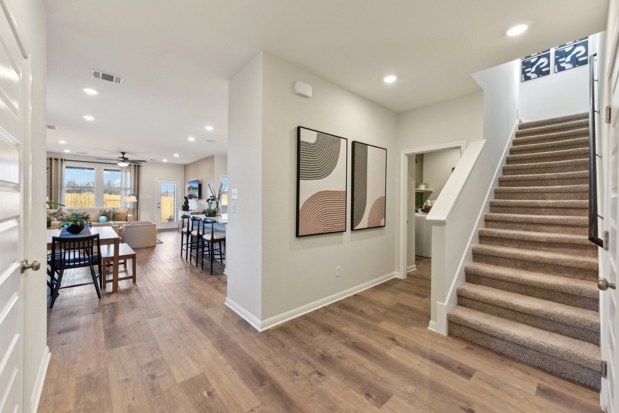 A large room with wood floors.