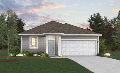 A house with a garage and a lawn in front of it.