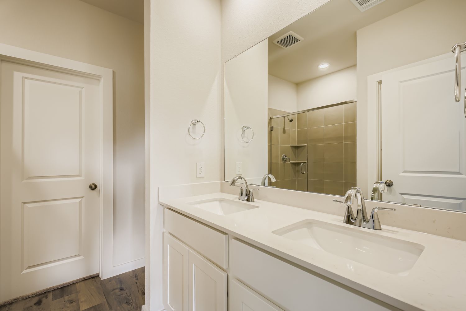 A bathroom with two sinks.