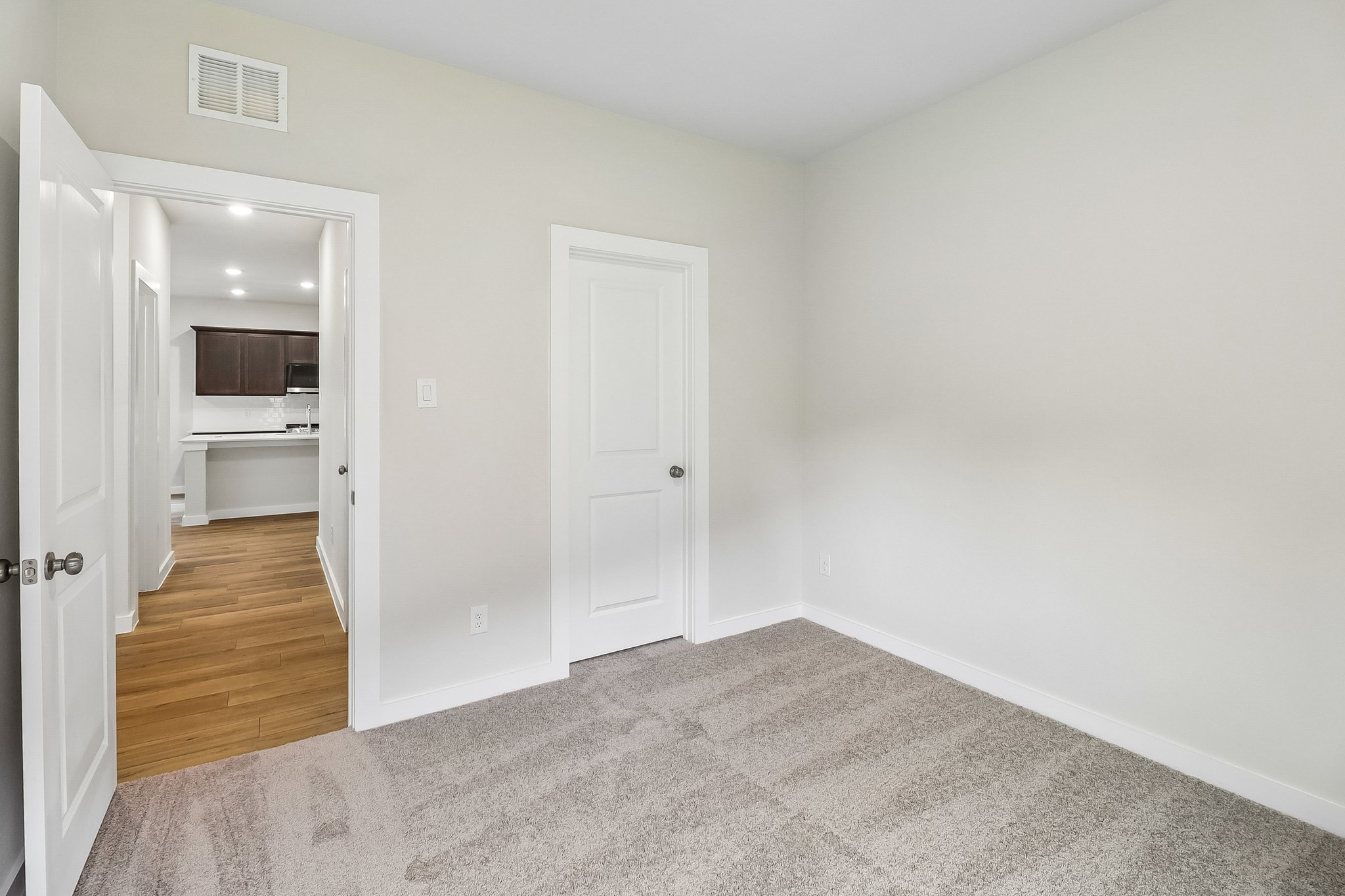 A room with white doors.