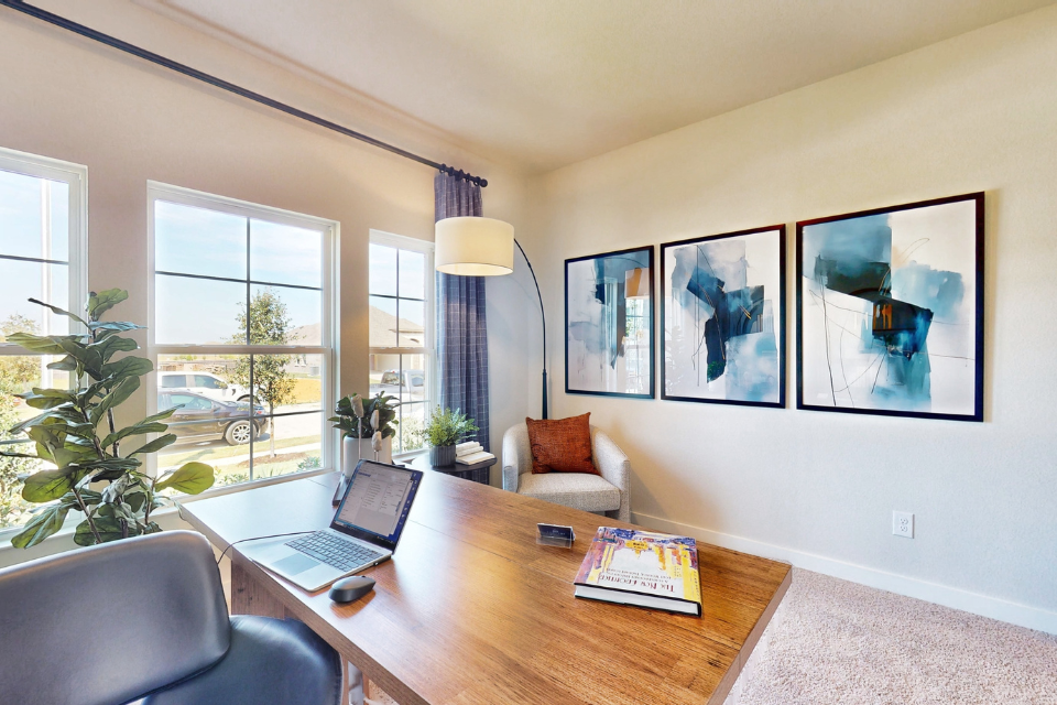 A laptop on a table.