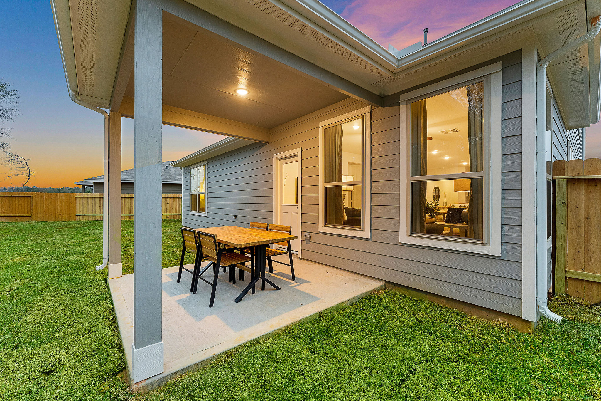 A house with a table and chairs.