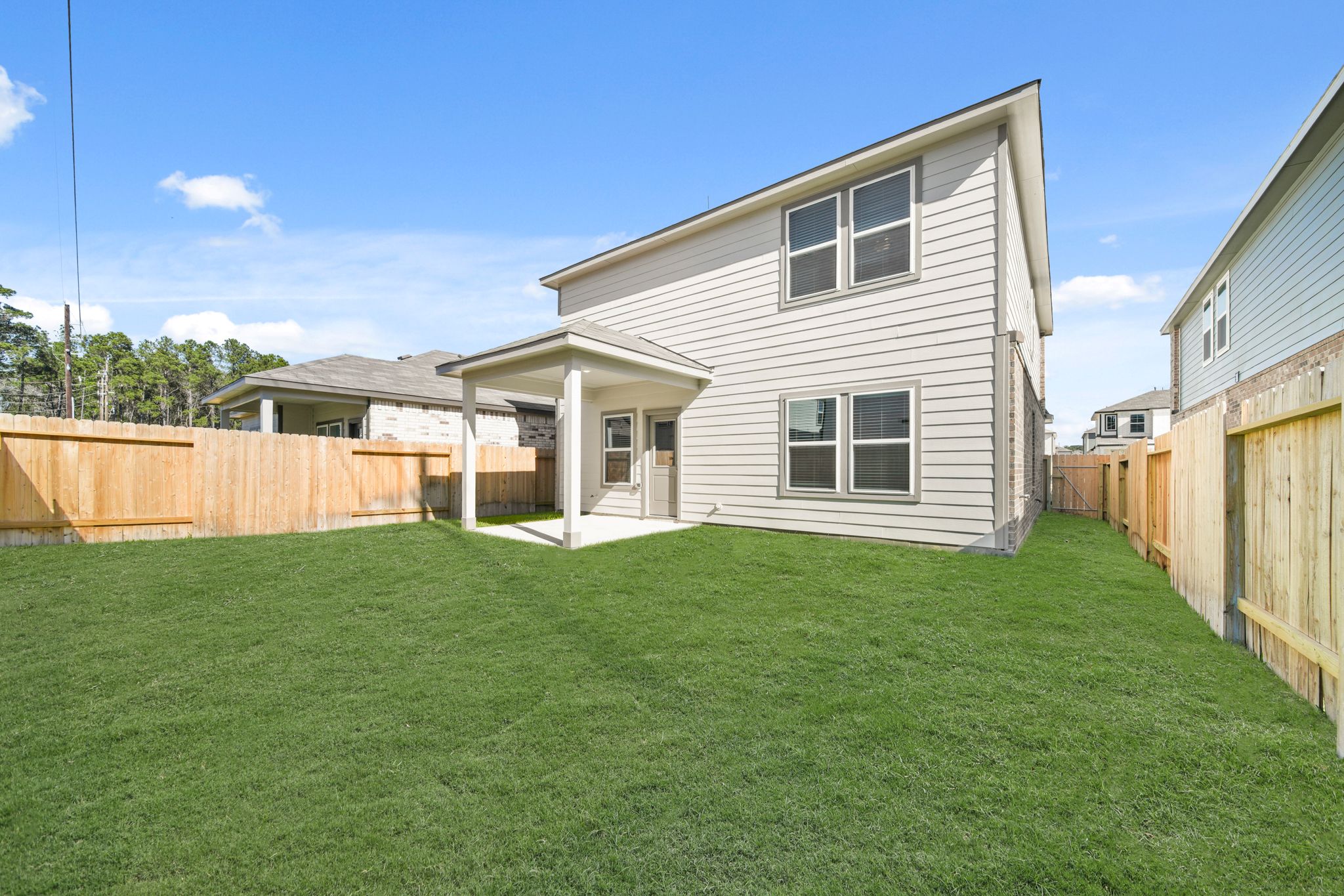 A house with a fence around it.