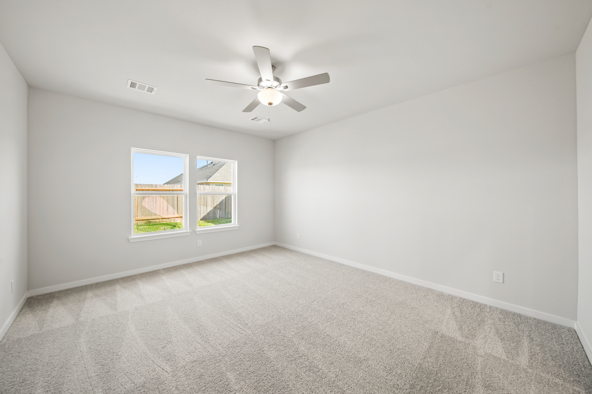 A ceiling fan in a room.