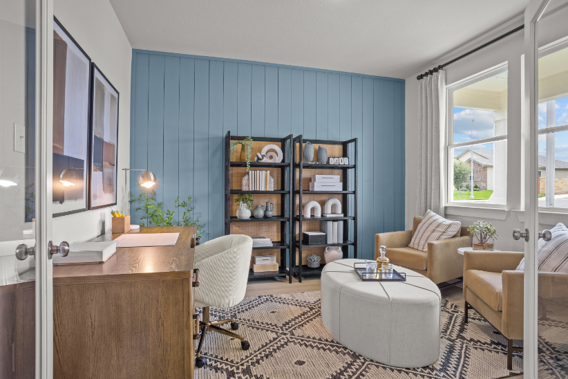 A living room with a blue wall.