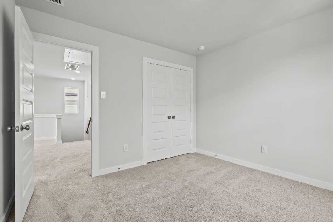 A room with white doors.