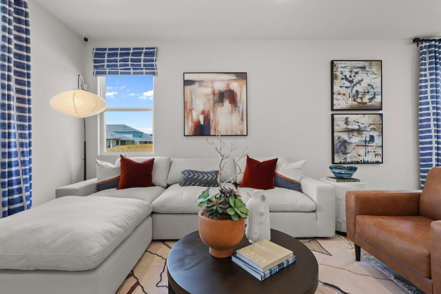 A living room with a large window.