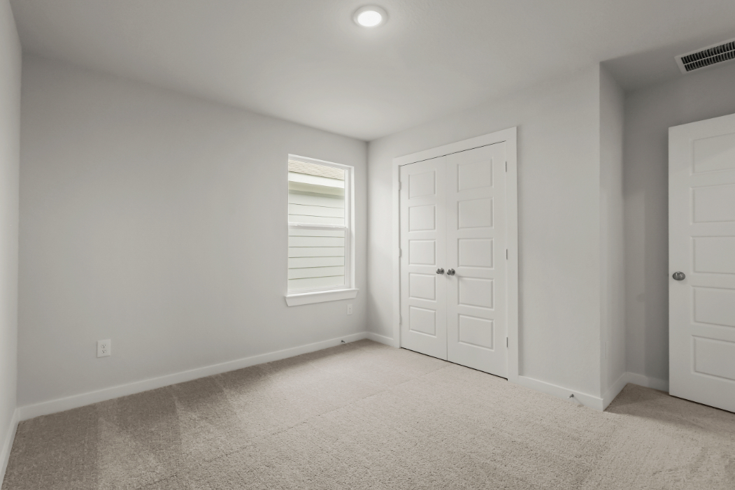 A room with white doors.