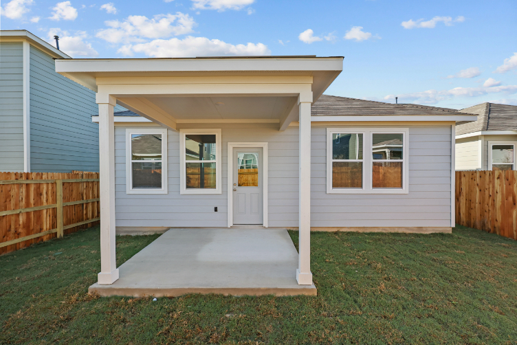 A small house with a small shed.