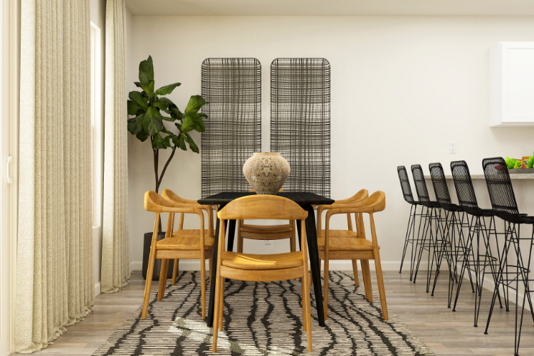 A table with chairs around it.