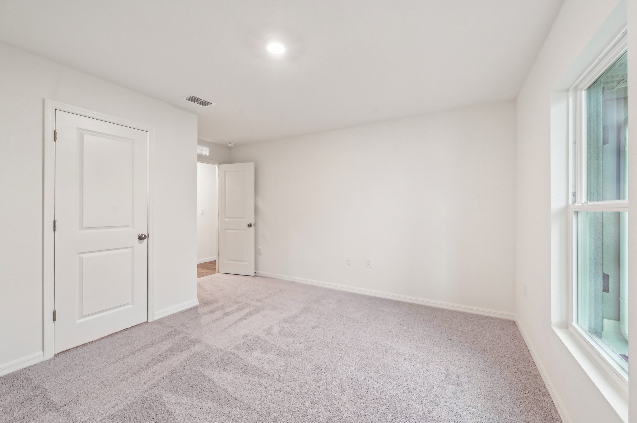 A room with white doors.