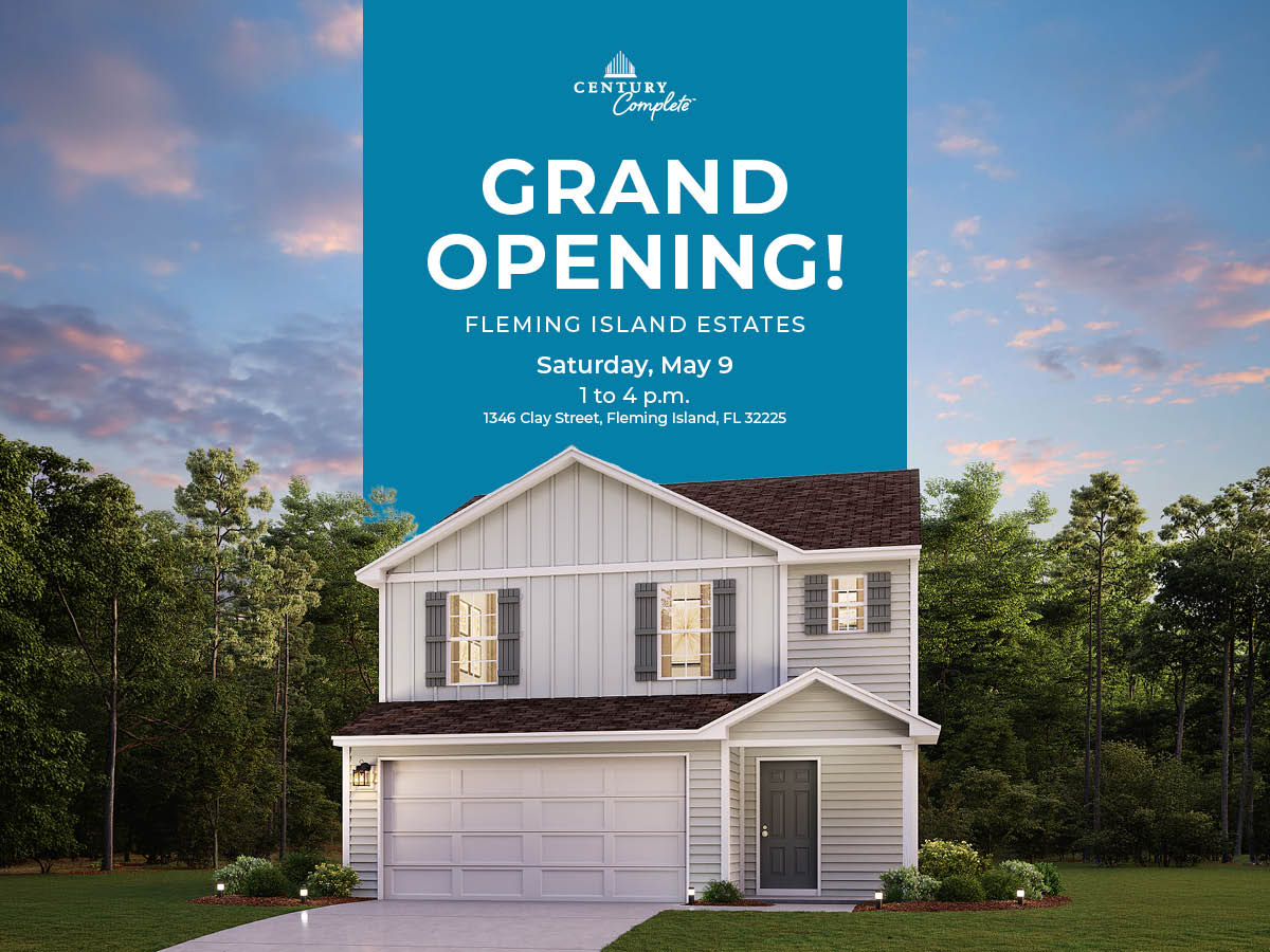 A house with trees in the back.