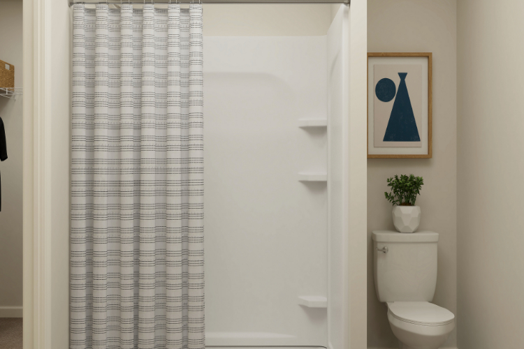 A bathroom with a shower curtain.