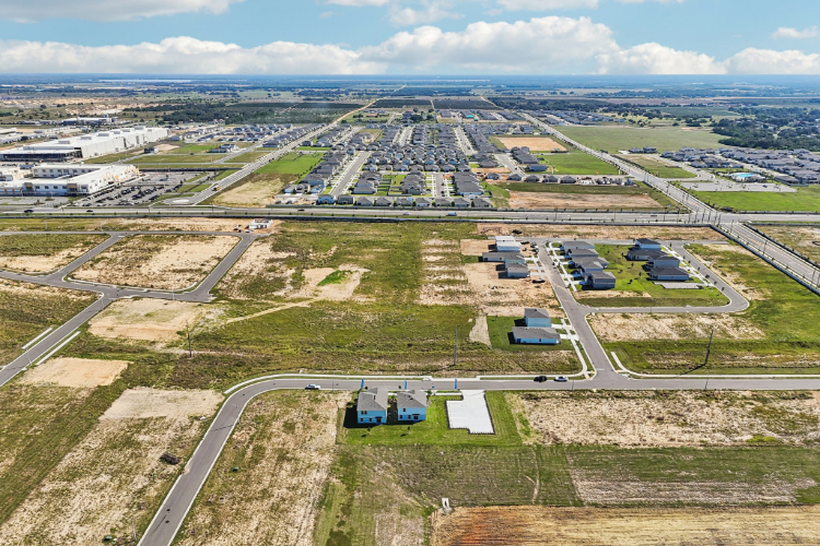 An aerial view of a parking lot.