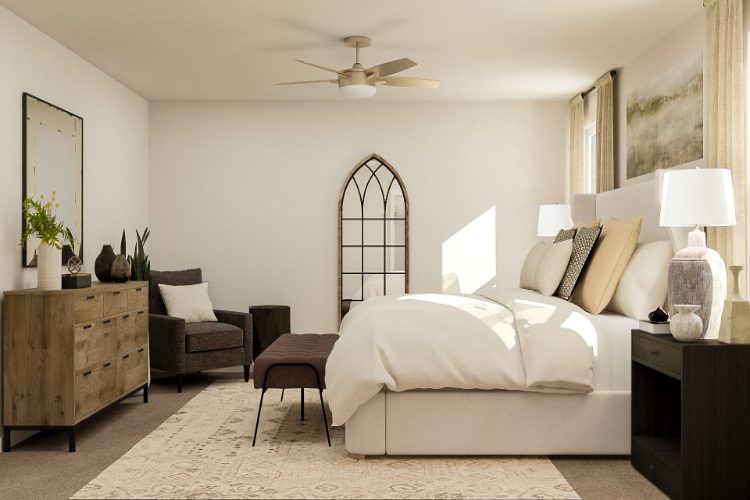 A large living room with a white couch and a fan.