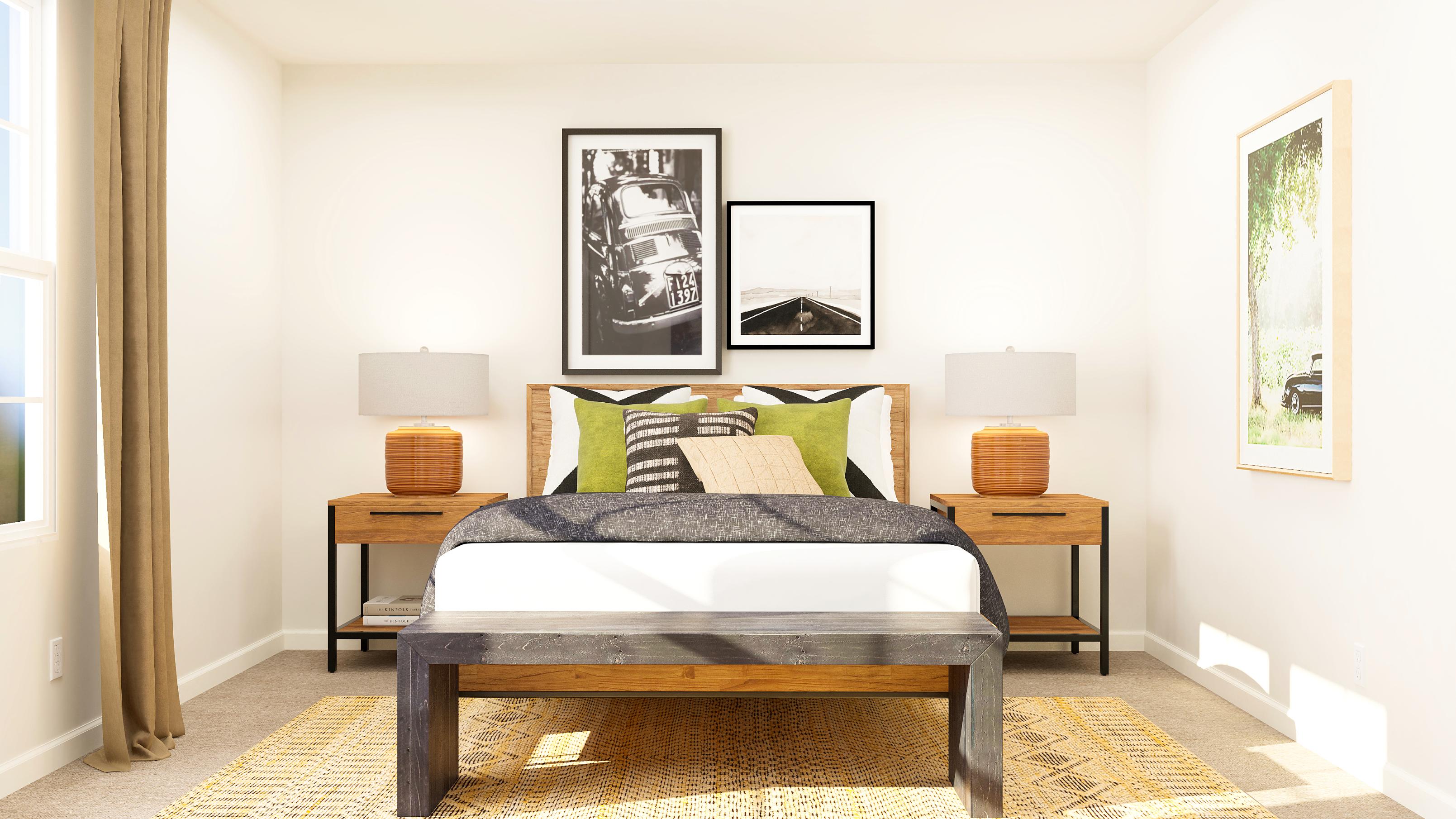 A bedroom with a bed and a table.