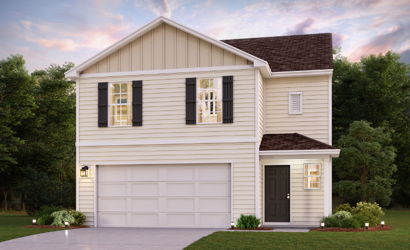 A white house with a garage.