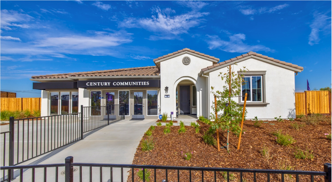A building with a fence in front.